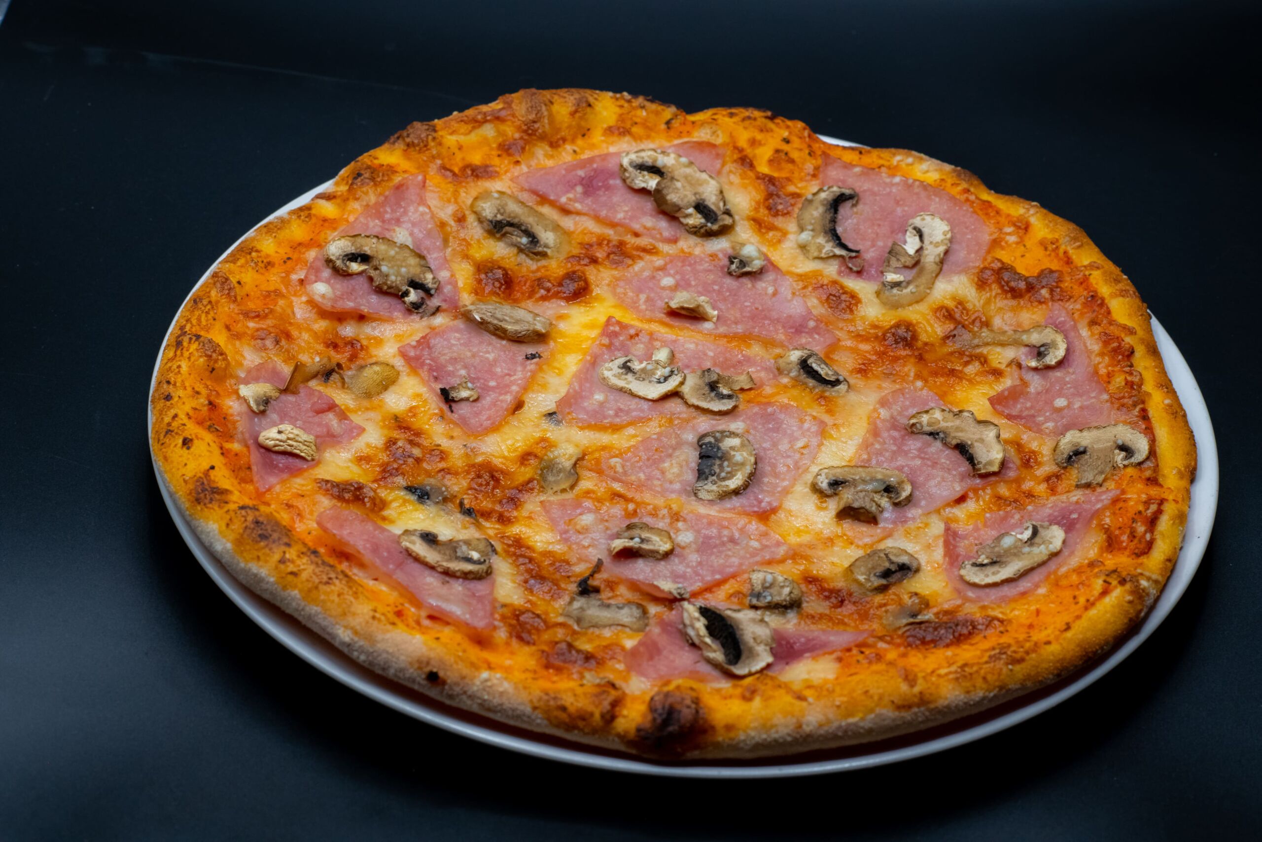 Pizza Prosciuto e Funghi